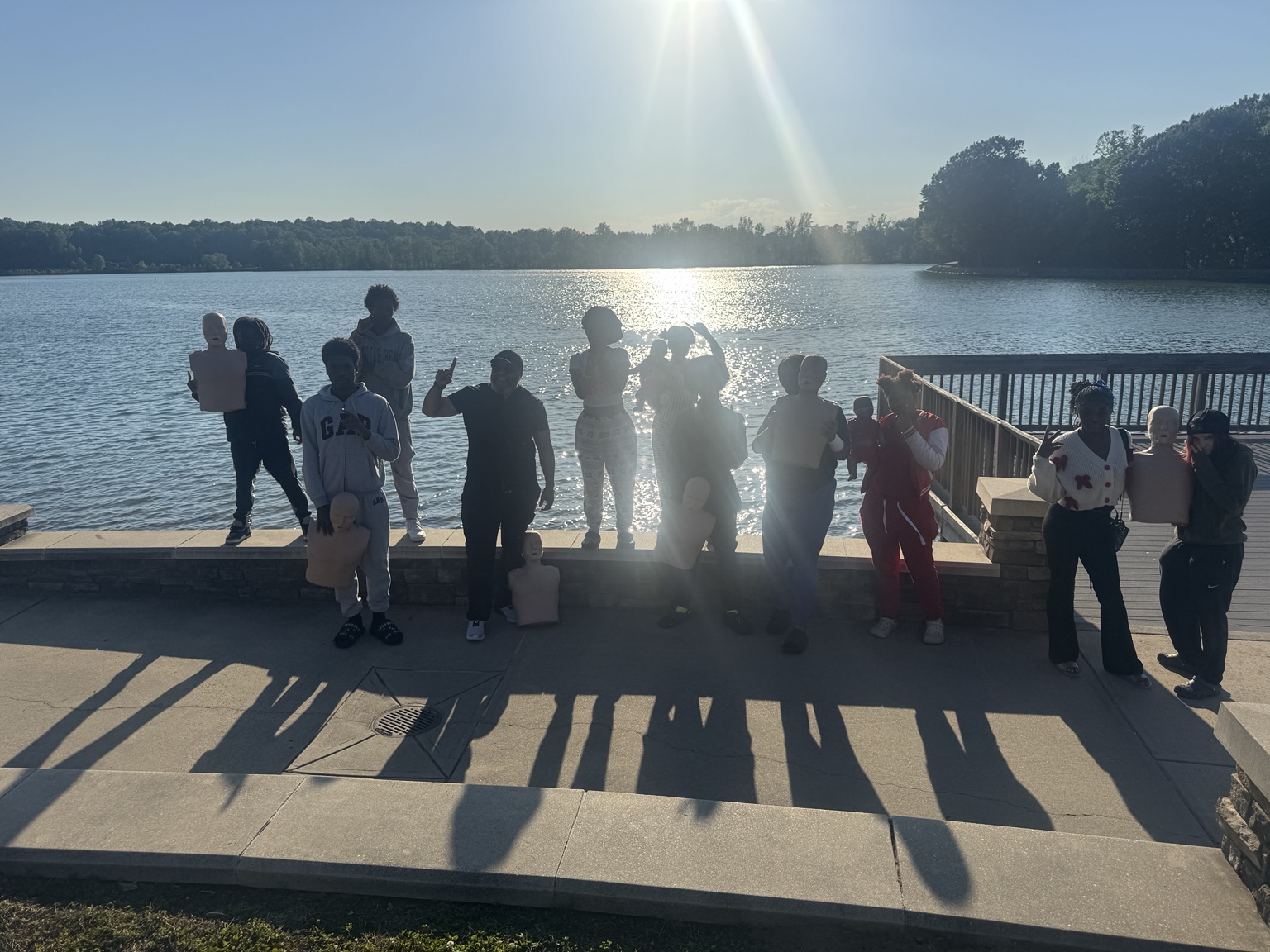 Breaking Away youth participating in CPR training during a community experience
