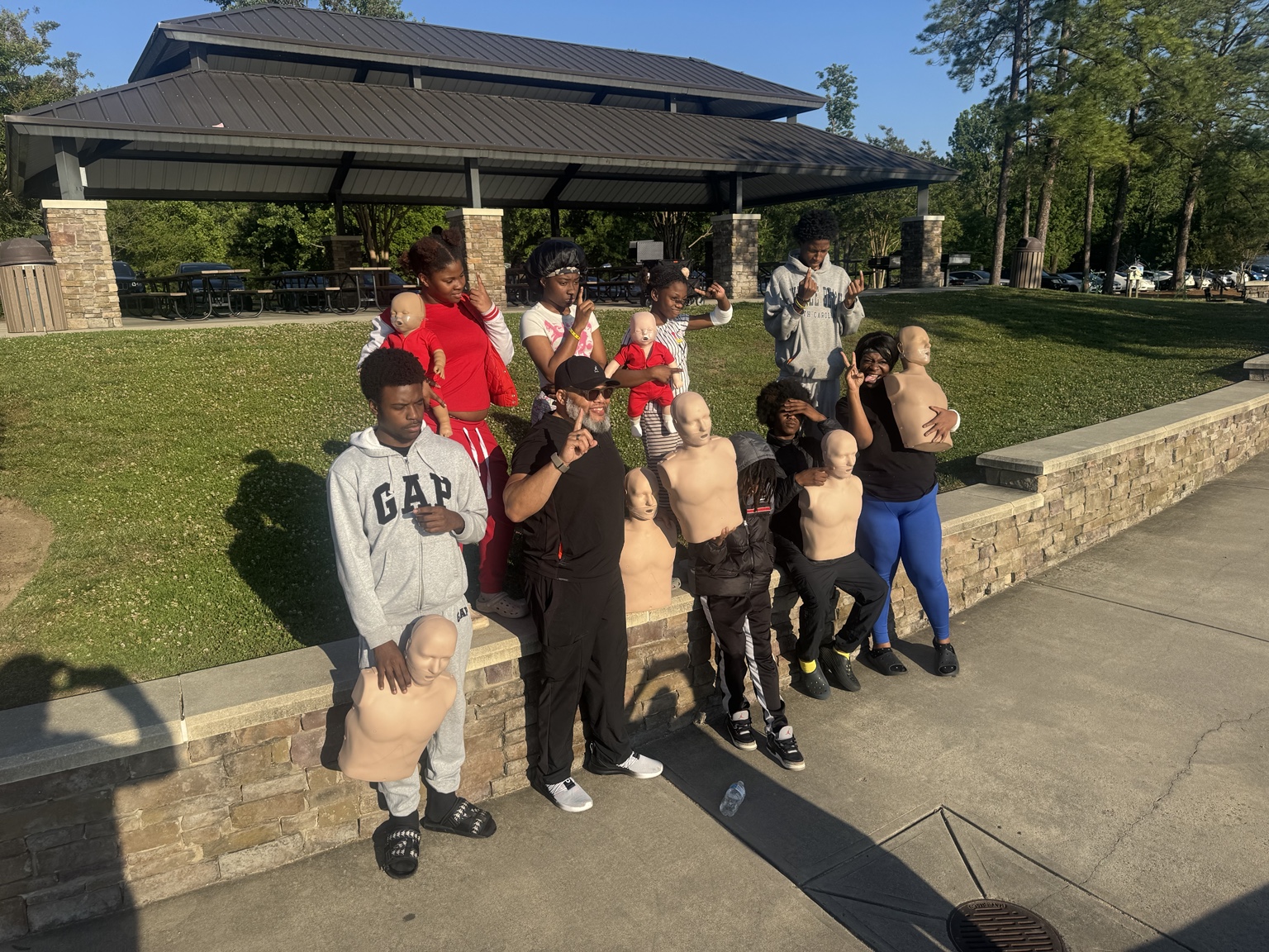 Youth and mentors together after CPR training
